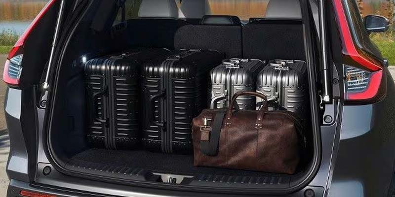 Spacious trunk of the 2026 Honda CR-V with luggage neatly arranged.