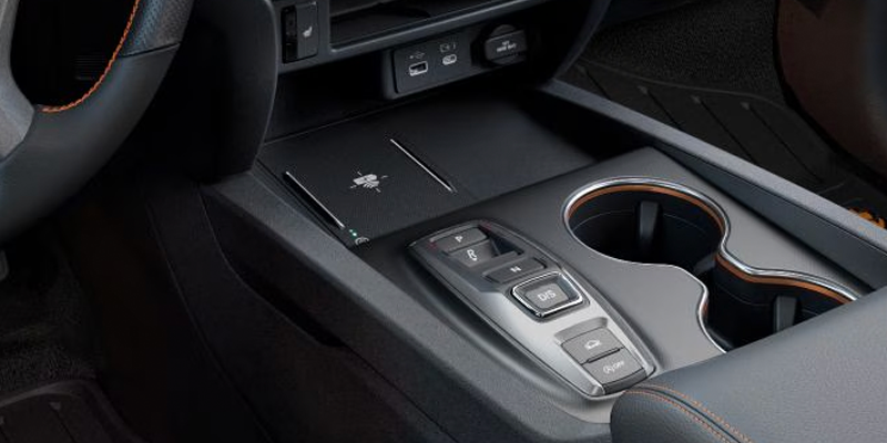 Close-up of Honda Ridgeline center console showing drive mode controls.